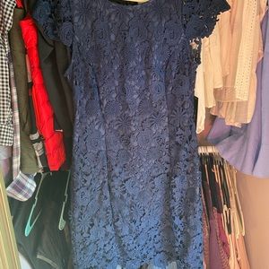 Bought for a wedding, but never worn.
